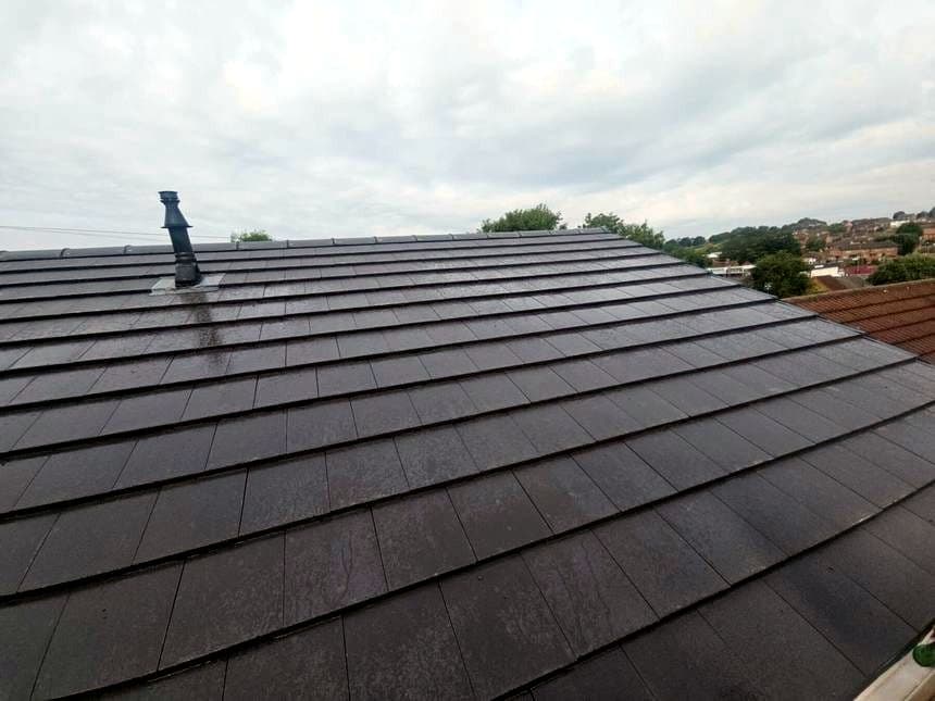 A finished grey tiled re-roof on a Nottingham house