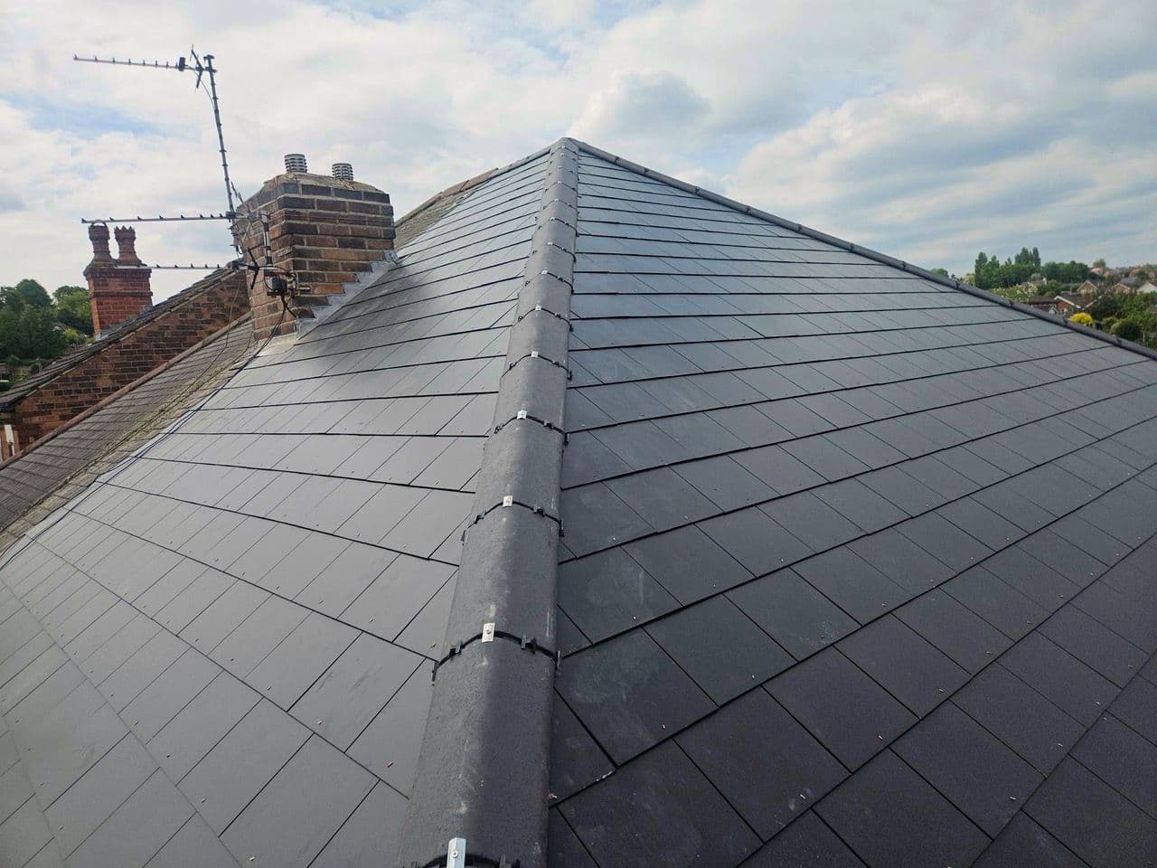 A finished slate hip roof