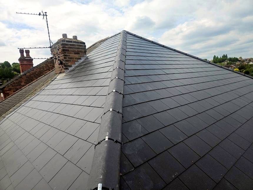 A finished slate roof and ridge